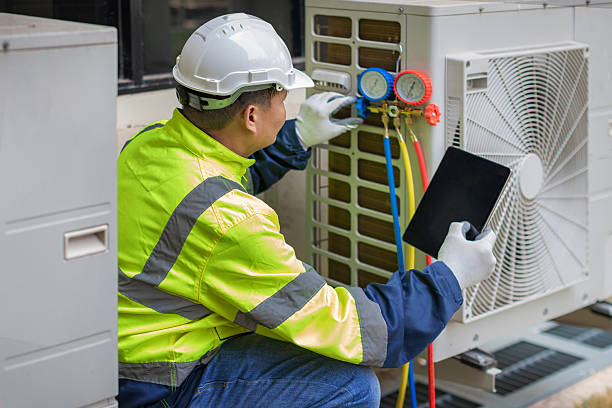Professional Air Conditioning Repair technician working in Rockwood, MI